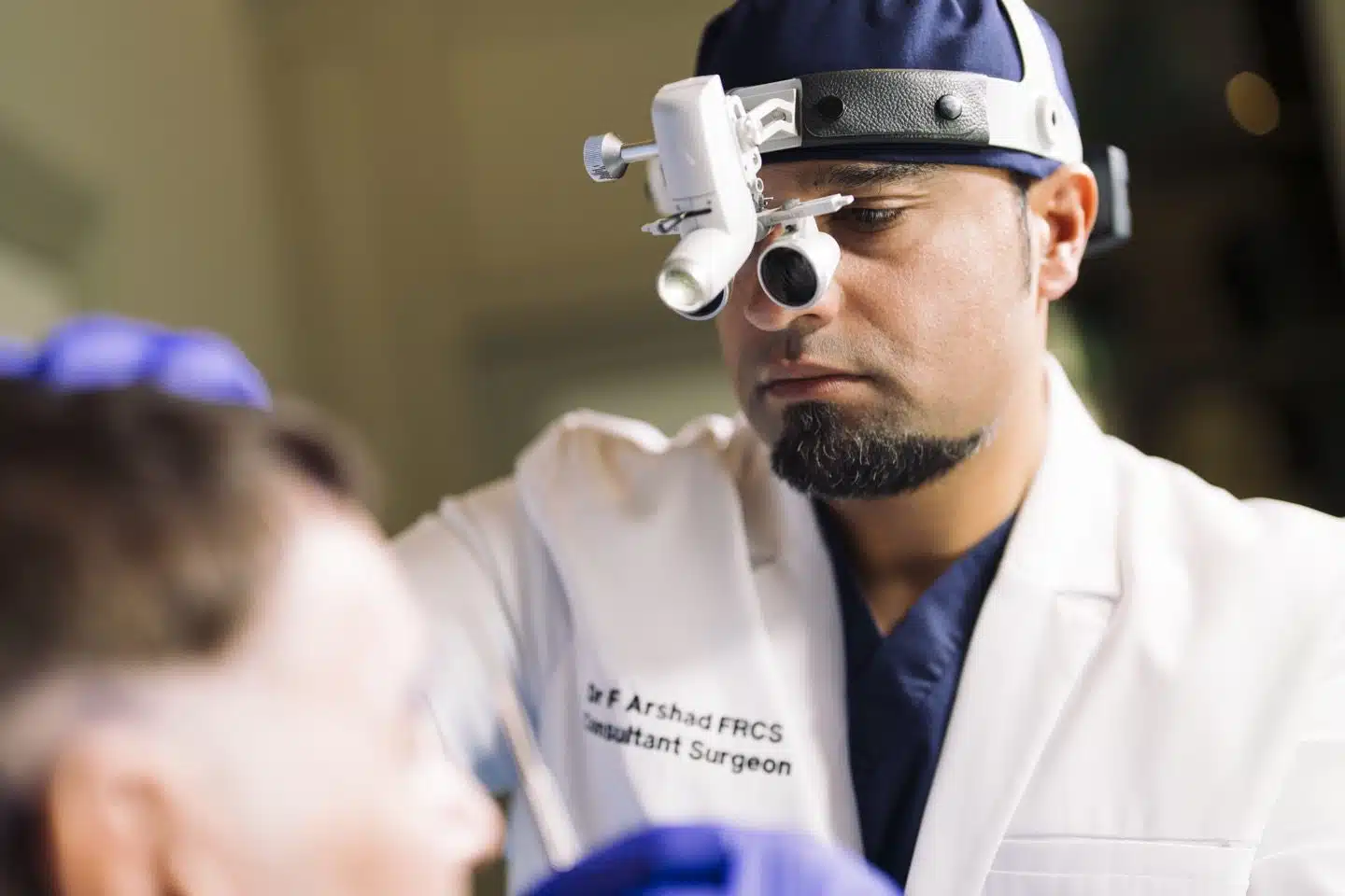 Doctor examining patient for facial transplant