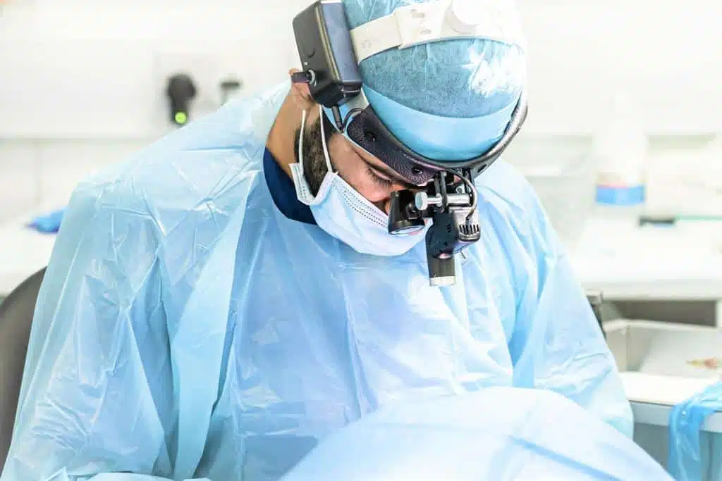 Doctor examining patient for facial transplant